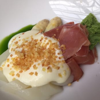 Van der Dussen - Asparagus with Belgian forest ham, parsley sponge cake, parsley oil, soft boiled egg foam topped with roasted potato crumble. - Modern European Near Me - Delft, ZH