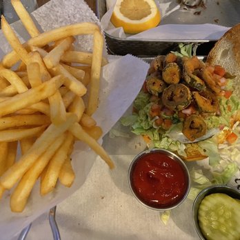 Tessie's bar & kitchen - House fries with holy guacamoly burger. - Burgers Near Me - Waltham, Massachusetts