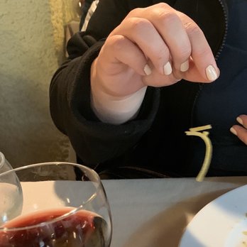 Osteria Nonna Gina - How the hair was ingrained into the pasta as I held the noodle up by the hair. - Tuscan Near Me - Siena, SI
