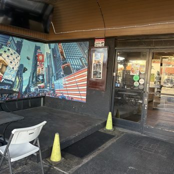 New York Bagel Cafe - The outdoor seating area with a picture of Times Square, NYC( my hometown) - Bagels Near Me - Sherman Oaks, California New York Bagel Cafe - The outdoor seating area with a picture of Times Square, NYC( my hometown) - Bagels Near Me - Sherman Oaks, California