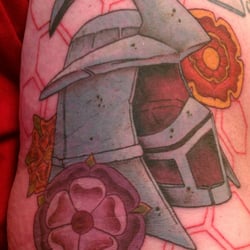 Origins In Ink - Shredder helmet tattoo by Dale at Origins In Ink.