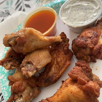 That Wing Spot - Lemon pepper on the left and dry rub on the right. - Chicken Wings Near Me - Orlando, Florida That Wing Spot - Lemon pepper on the left and dry rub on the right. - Chicken Wings Near Me - Orlando, Florida