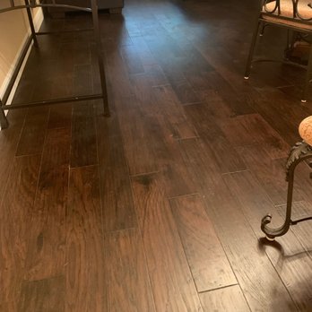 Perfect Choice Flooring - a hardwood floor in a living room - Flooring Near Me - Tampa, Florida Perfect Choice Flooring - a hardwood floor in a living room - Flooring Near Me - Tampa, Florida