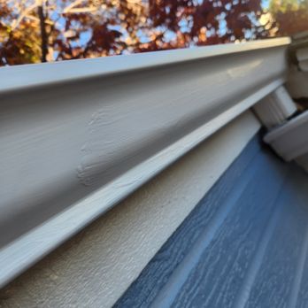 Vivax Pros - paintbrush marks on eye level gutter - Painters Near Me - Denver, Colorado