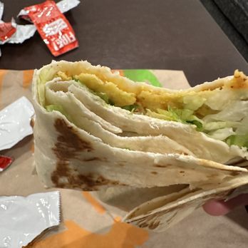 Taco Bell - This is supposed to be a Crunchwrap Supreme. I'm halfway through this and I'm still just getting tortilla and lettuce. - Fast Food Near Me - Lehi, Utah Taco Bell - This is supposed to be a Crunchwrap Supreme. I'm halfway through this and I'm still just getting tortilla and lettuce. - Fast Food Near Me - Lehi, Utah