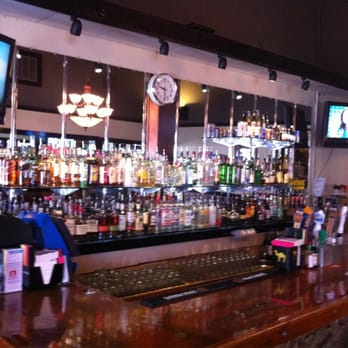 Commodore Lounge - a bar with a large television - New American Near Me - Portland, Oregon