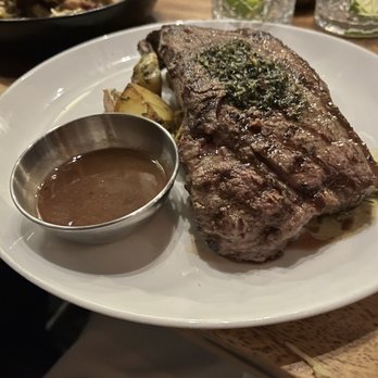 Limón - Churrasco  16 oz Braveheart Angus grilled New York steak served with chimichurri roasted potatoes, & Aji Panca Cabernet demi-glace. - Peruvian Near Me - Walnut Creek, California