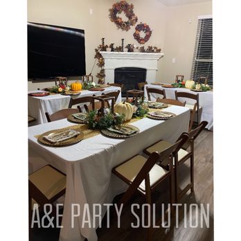 A & E Party Solution - 6ft tables w/ brown garden chairs and white table lines. - Bounce House Rentals Near Me