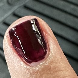 Sloppy, uneven polishing for a basic $20 mani.