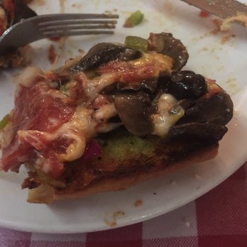 Caruso's - We scooped toppings onto garlic bread. Crust is disgusting! - Pizza Near Me - Tucson, Arizona Caruso's - We scooped toppings onto garlic bread. Crust is disgusting! - Pizza Near Me - Tucson, Arizona