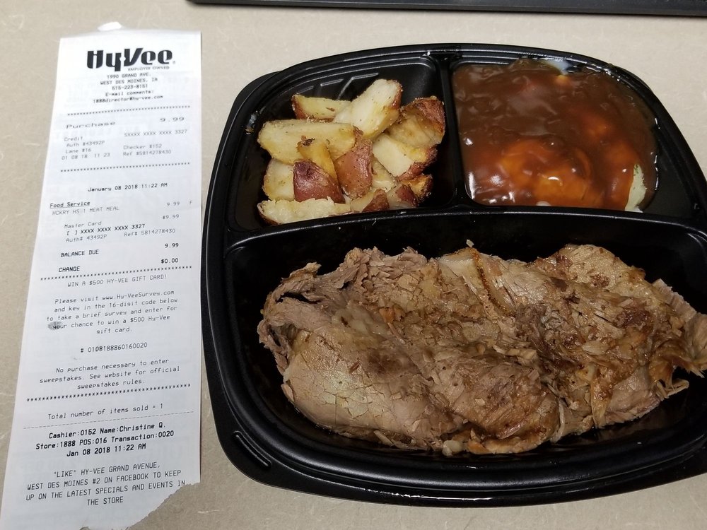 the hy-vee market grill Logo