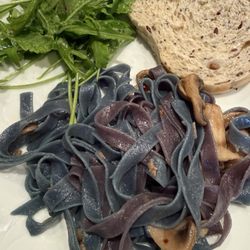 Pasta with mushrooms and garlic sauce.