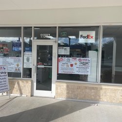 Postal & Global Royal Palm - Store Front
