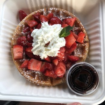 Delicious Crepes & Waffles - Strawberries and cream waffle with chocolate sauce on the side - Creperies Near Me - Pasco, Washington