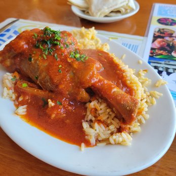 Greek Corner Restaurant - Lamb in red sauce. I can't believe this only costs $16 and change. Meat falls off the bone, incredible. - Greek Near Me - Cambridge, Massachusetts Greek Corner Restaurant - Lamb in red sauce. I can't believe this only costs $16 and change. Meat falls off the bone, incredible. - Greek Near Me - Cambridge, Massachusetts