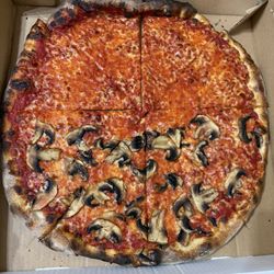 Pacidough's Pizza Joint - Delicious pizza pie! Half plain, half mushroom.