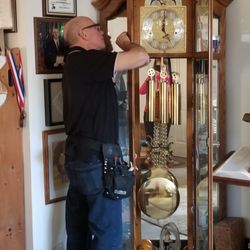 Avon Clock Shop - Bill Morgan repairing our Howard Miller Curio Grandfather Clock