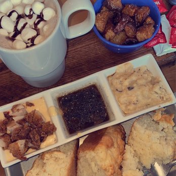 Biscuit Head - Gravy Flight- Fried Chicken Gravy, Espresso Red Eye Gravy, and Shiitake Mushroom Gravy; with home potatoes and Hot Chocolate - Breakfast & Brunch Near Me - Greenville, South Carolina