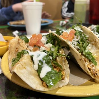 El Mexiquense - two tacos on a yellow plate - Mexican Near Me - Saint Louis, Missouri