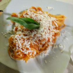 La Duchessa - This is supposed to be plain spaghetti with just tomato sauce... notice the salted ricotta on top.
