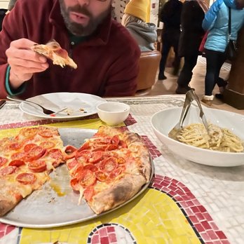 Lupo - Pepperoni pizza and caccio e Pepe - Italian Near Me - Banff, Alberta Lupo - Pepperoni pizza and caccio e Pepe - Italian Near Me - Banff, Alberta