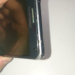 The FIX - Mall of Georgia - Frame damage from what looks like a screw driver