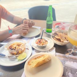 Casa Denis - Garlic shrimp with bread, chips & pico de gallo, mango margarita