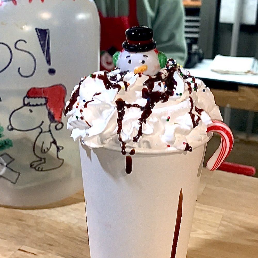 Christmas In The Park - The famous Christmas in the Park hot chocolate - whip cream, sprinkles, chocolate drizzle, a candy cane, cherry, & cute snowman on top! - Festivals Near Me - San Jose, California