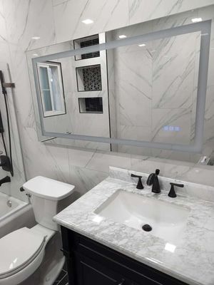 Bathroom Remodel - These bathroom remodels highlight our commitment to premium craftsmanship and modern design. Each space was transformed into a spa-like retreat with luxury tile work, elegant fixtures, and thoughtful architectural details. From spacious walk-in showers and custom niches to free-standing tubs and striking marble finishes, these bathrooms showcase both functionality and refined style—elevating everyday routines with sophistication and comfort.