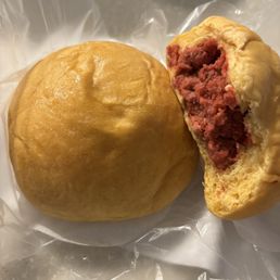 Cold baked manapua, a generous portion of diced pork. Strong after taste left on the palate, was not desirable. Cold baked manapua, a generous portion of diced pork. Strong after taste left on the palate, was not desirable.
