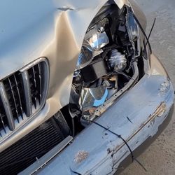 Mel's Auto Service - Put in a battery and radiator at a local parts house, then began the journey to the salvage yard to find some matching pieces