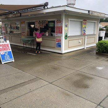 Uncle Dave's Kettle Korn - a woman standing in front of a kiosk - Popcorn Shops Near Me - Williamsburg, Virginia Uncle Dave's Kettle Korn - a woman standing in front of a kiosk - Popcorn Shops Near Me - Williamsburg, Virginia