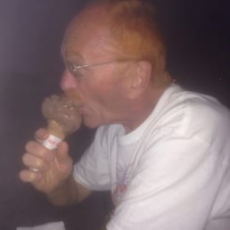a man eating a doughnut a man eating a doughnut