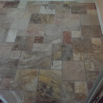 Odd Job Larry - a tile floor in a bathroom - Handyman Near Me - Kenosha, Wisconsin Odd Job Larry - a tile floor in a bathroom - Handyman Near Me - Kenosha, Wisconsin