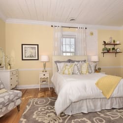 Red Brick Inn of Augusta - Our charming, window filled, Cottage room features a beautiful fireplace wall and brick hearth.