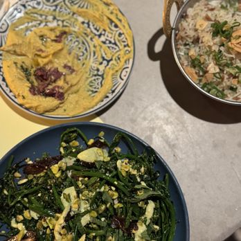 Shukette - Fava beans with turmeric and Kalamata olives, Rice, broccolini with tahini and dates - Middle Eastern Near Me - New York, New York Shukette - Fava beans with turmeric and Kalamata olives, Rice, broccolini with tahini and dates - Middle Eastern Near Me - New York, New York