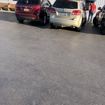 RJ's Ice Cream - three cars parked in front of a building - Ice Cream & Frozen Yogurt Near Me - Lockport, New York
