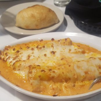 Villa Amore - Cannelloni - Pasta stuffed with beef, spinach, ricotta cheese, baked in our signature creamy marinara sauce, topped with melted mozzarella - Italian Near Me - Lincoln, Nebraska Villa Amore - Cannelloni - Pasta stuffed with beef, spinach, ricotta cheese, baked in our signature creamy marinara sauce, topped with melted mozzarella - Italian Near Me - Lincoln, Nebraska