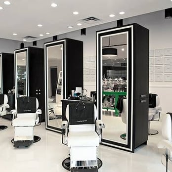 REDRHINO - a salon with mirrors and chairs - Flooring Near Me - Los Angeles, California REDRHINO - a salon with mirrors and chairs - Flooring Near Me - Los Angeles, California