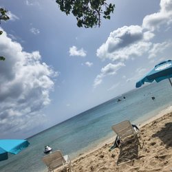 Rainbow Beach - Rent a beach chair & umbrella if you don't have your own.
