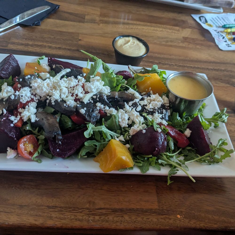 Beet, goat cheese, and arugula salad.