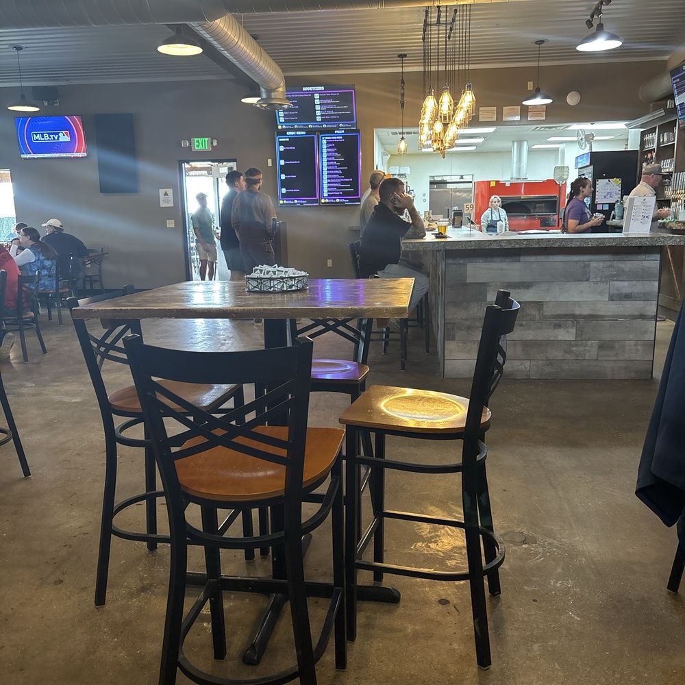 Interior space with bar area (more low top tables to the left)