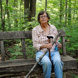 Richard P Gravely Jr Nature Preserve - Mom sitting on a bench about halfway along the main trail