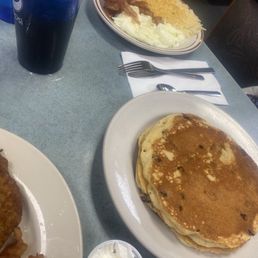 Chocolate chip pancakes, egg whites, bacon, hashbrowns
