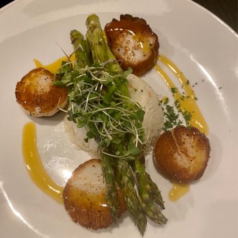 Manera's Restaurant - Scallops with passionfruit glaze, rice and asparagus - New American Near Me - Brick Township, New Jersey Manera's Restaurant - Scallops with passionfruit glaze, rice and asparagus - New American Near Me - Brick Township, New Jersey