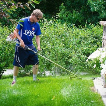 Bozeman Site Services - a man mowing the lawn - Snow Removal Near Me - Belgrade, Montana