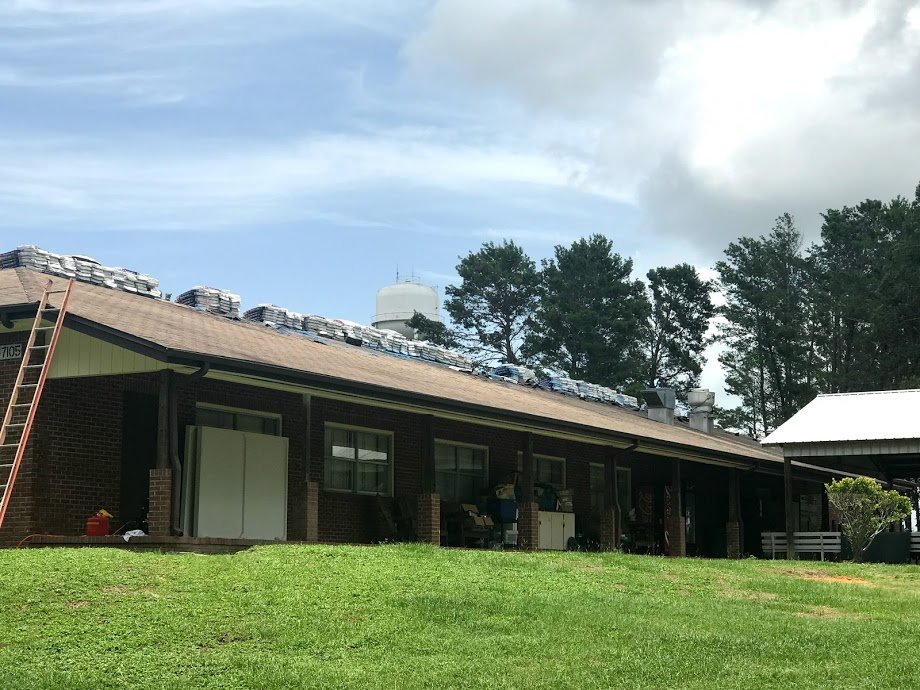 Slide of Tauros Roofing Services