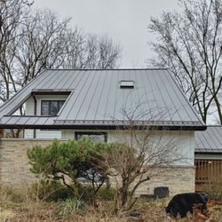 Rodawold - Metal roof by Rodawold Roofing with snow guards