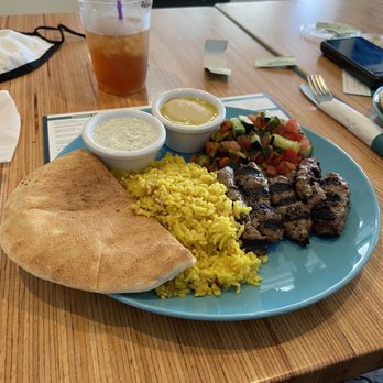 Maya's Modern Mediterranean - Beef kabob with Turmeric rice, Israeli Salad and Pita bread. Tzatziki sauce and Hummus dip on side. - Mediterranean Near Me - Dallas, Texas