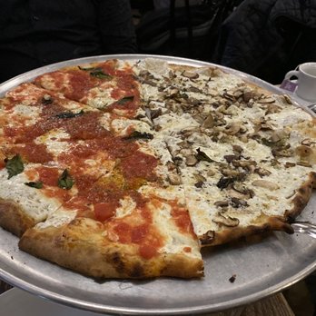 Juliana's - Half Margherita + half White with mushrooms and Garlic - Pizza Near Me - Brooklyn, New York Juliana's - Half Margherita + half White with mushrooms and Garlic - Pizza Near Me - Brooklyn, New York